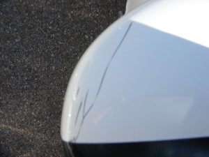 Scratched side view mirror.